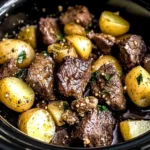 crockpot garlic butter beef bites with potatoes